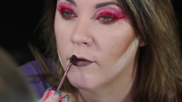 Makeup Artist Applying Lipstick — Stock Video