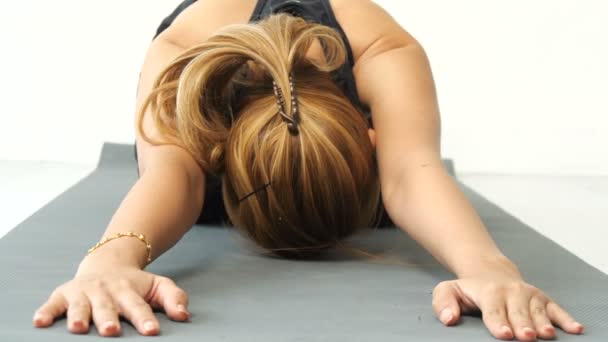 Happy Asian Woman Doing Yoga Child Pose Home — Stock Video