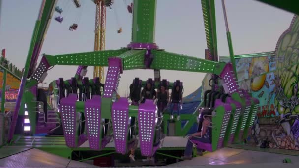 People Enjoy Swinging Thrill Ride Slow Motion Sunny Day County — Stock Video