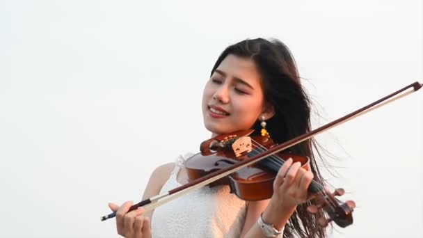 Young Beautiful Asian Girl Wearing Dress Plays Violin Standing Beach Stock Footage