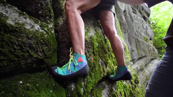 Closeup Shoes Gripping Rock Face Elderly Woman Climbs — Stock Video