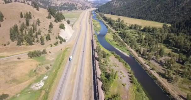 Arial Shot Train Driving Highway River Usa Westcoast Transporting Coal — Stock Video