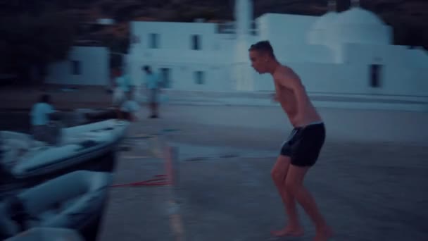 Young Man Dives Water Dock Greek Beach Happy Faces Greek — Stock Video