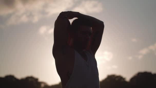 Young Attractive Man Stretching Park Works Out — Stock Video