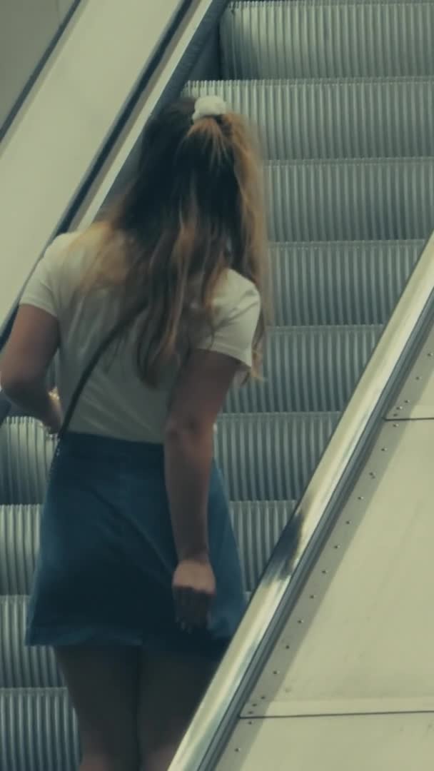 Young Woman Fixing Her Skirt Her Way Escalator Subway Stockholm — Stock Video