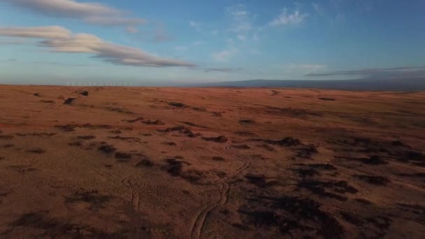 Drone Shot Vast Arid Land Sunrise Showing Wind Turbines Distance — Vídeos de Stock