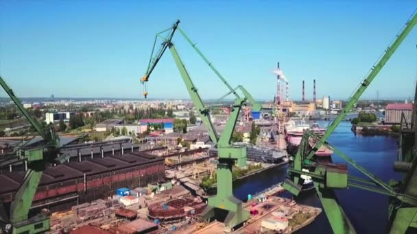 Drone Flying Back Shipyard Cranes — Stock Video