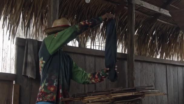 Amazon Rainforest Farmer Empties Bag Full Cracked Roasted Guaran Seeds — Stockvideo