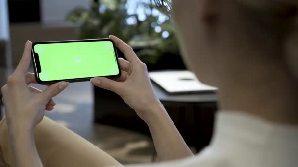 Shot Can See Girl Sitting Holding Mobile Smartphone Landscape Position — Stockvideo