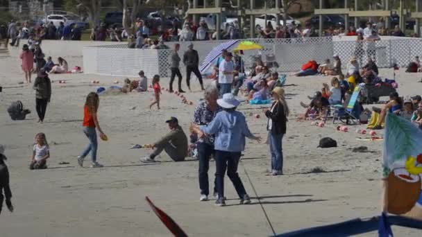 Older couple dancing on the beach