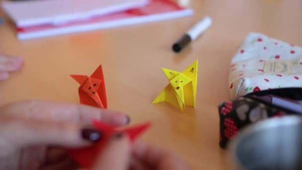 Close Shot White Caucasian Hands Playing Origami Art Paper Folding — 비디오