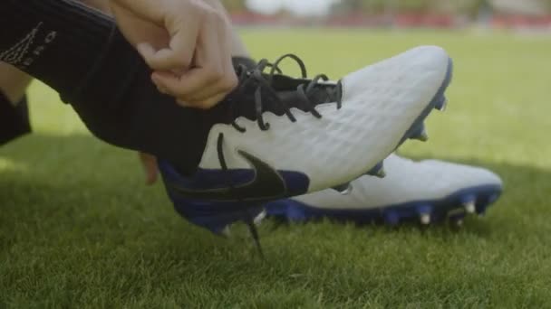 Football Player Putting His Football Boots Footage Croatia — Vídeos de Stock