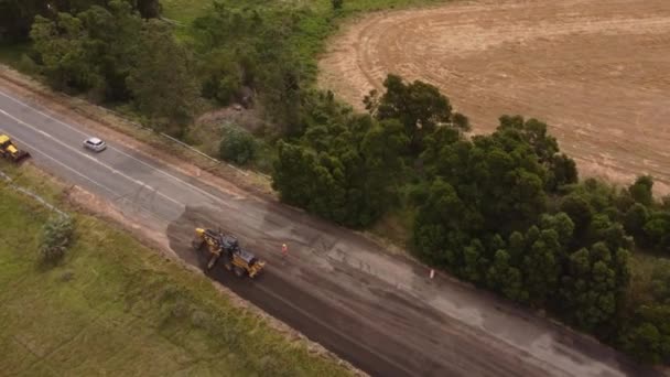 Aerial View Countryside Road Widening Using Heavy Machines — Vídeo de Stock