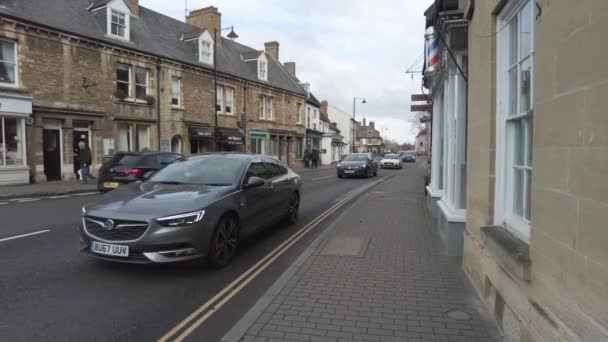 Cars Driving Village High Street Rural England — Stockvideo