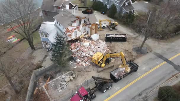 Drone Shot Grabber Unloading Rubble Demolished House Aerial Static Top — Video