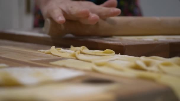 Flattening Dough Rolling Pin Twisted Angel Wings Dough Foreground Selective — ストック動画