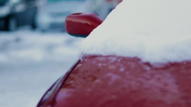 Panning Handheld Close Snow Frost Hood Red Car — Stock Video