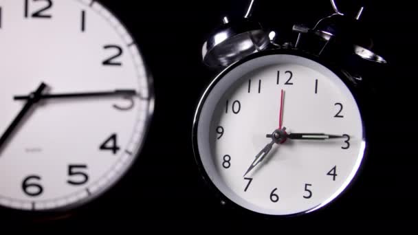 Zoom Out One Modern One Traditional Alarm Clock Covering Hours — Stockvideo