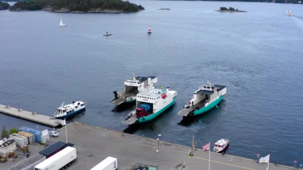 Aerial View Three Cargo Shipment Shipping Vessels Boats Leave City — Video