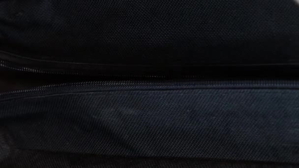 Horizontal Macro Shot Male Hand Opening Grey Zipper Blue Bag — Stockvideo