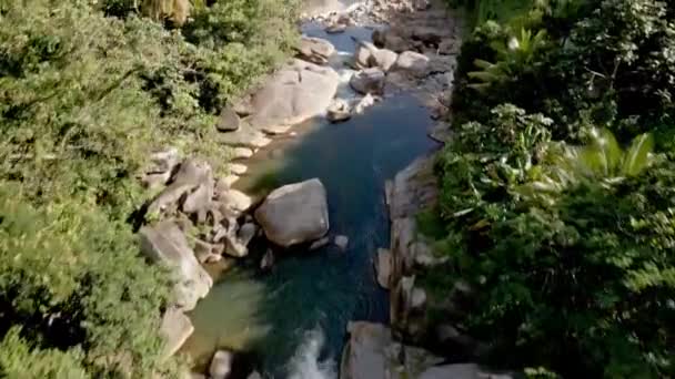 Drone Aerial Shot Waterfall Surrounded Houses Trees Rocks — Stockvideo