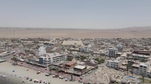 Aerial Small Pacific Town Paracas Peru Endless Sandy Desert — Stock videók