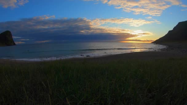 Midnight Sun Unstad Beach Passing Clouds Blue Sky Lofoten Island — стоковое видео