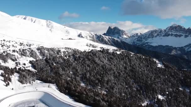 Aerial panoramic landscape view of italian alp mountains covered in snow, in winter