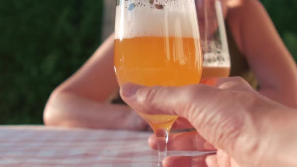 Beer Glass Lifted Sip Sunny Home Garden Woman Blurry Background — Video Stock