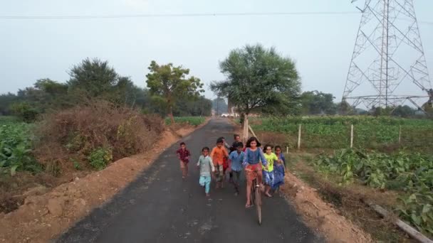 Indian Child Bicycle Running Aerial View Village Aera Road Vintage — Stockvideo