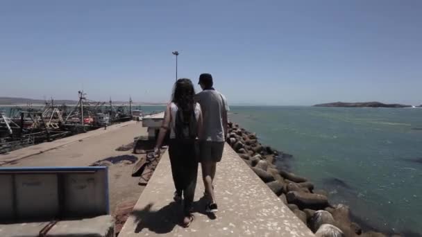 Young Couple Walking Essaouira Port — Stockvideo