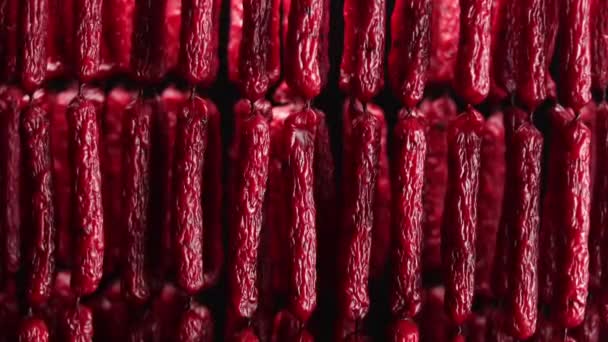 Smoked Beef Jerky Links Studio Black Background — Stockvideo