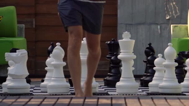 Man Walks Giant Chessboard Game Tropical Resort Koh Samui Thailand — Stock video