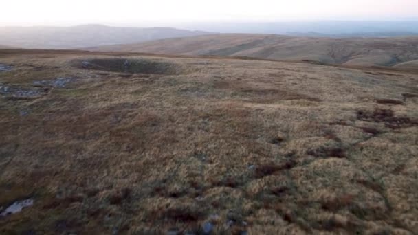 Aerial Drone Shot Moving Moorland Sink Holes Sunset — Vídeos de Stock