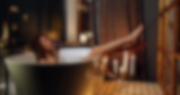Blurred Shot Woman Taking Bath Glass Wine While Listening Music — Stockvideo