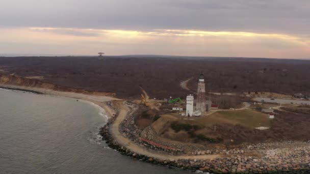 Aerial View Montauk Lighthouse Cloudy Sunset Drone Camera Truck Left — Wideo stockowe