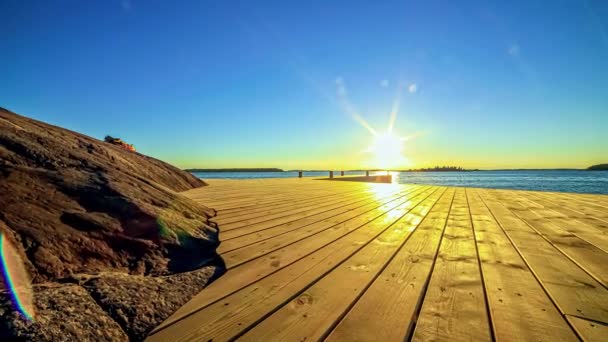 海と夕日の桟橋と桟橋の美しいタイムラプスショット — ストック動画