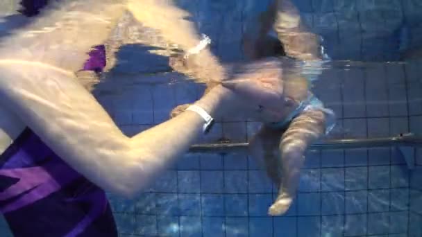 Little Baby Her Mother Having Swimming Lesson Pool Mother Holding — стоковое видео