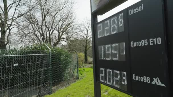 Barbed Wire Fence Protecting Fuel Price Display Concept Gasoline Expensive — Stock video