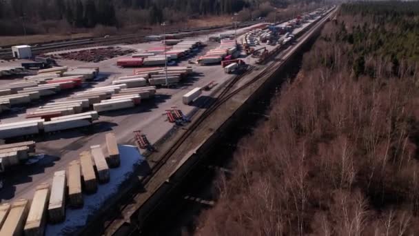 Cargo Train Passing Vancouver Shipping Terminal Canada Aerial Drone View — стоковое видео