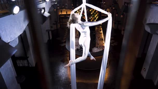 Female Aerialist Doing Iron Cross Pose Silks Music Club — Vídeo de Stock