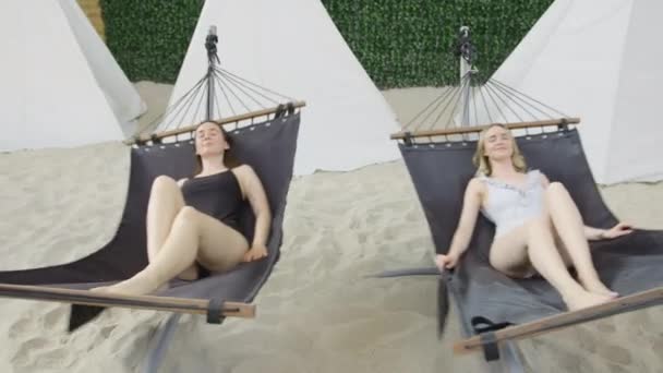 Two Sexy Caucasian Young Woman Swinging Hammock Sandy Beach Wearing — Stock video