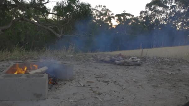 Shot Campfire Burning Smoke Blowing Rural Australian Property — ストック動画