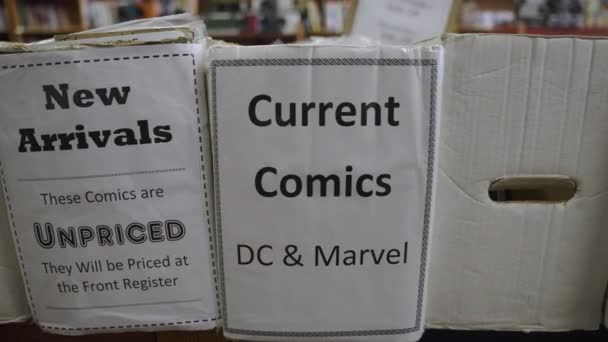 Tracking Shot Comic Book Boxes Store Slow Motion — Vídeo de stock