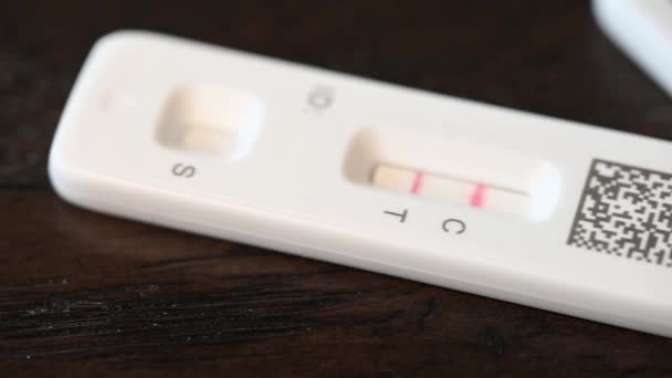 Slow Macro Slide Double Line Positive Covid Tests — Stock Video