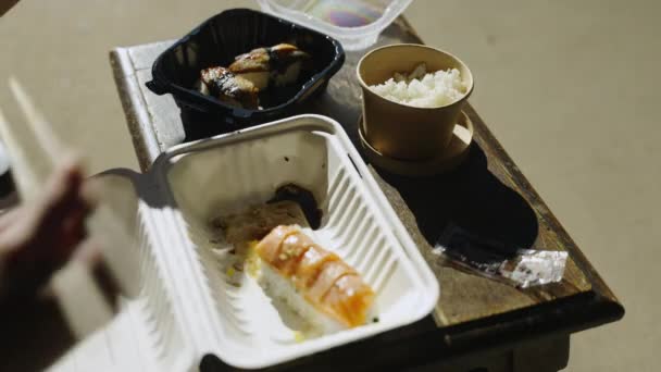 Trying Eat Shooing Away Flies Sushi Entree Roll Rice Eel — Stockvideo