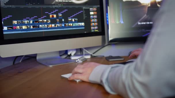 Unrecognizable Video Editor Editing Computer Media Production Studio — Stockvideo