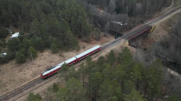 Aerial Old Red Train Rides Bridge River — Stock video