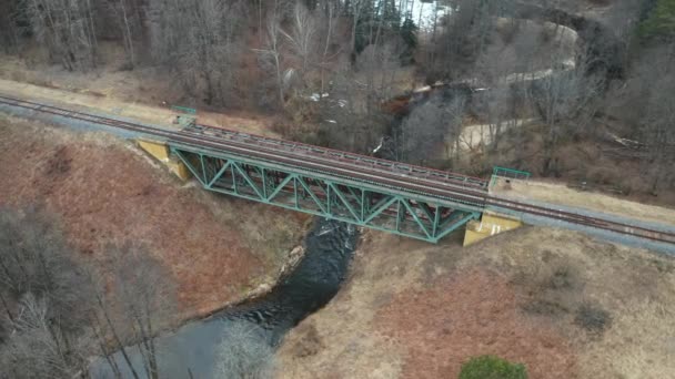 Aerial Train Tracks Top Bridge Constructed Flowing River — Vídeos de Stock