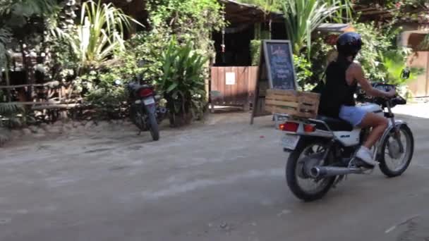 Young Girl Riding Motorcycle Sunny Day Muddy Dirt Road Laidback — Stok Video